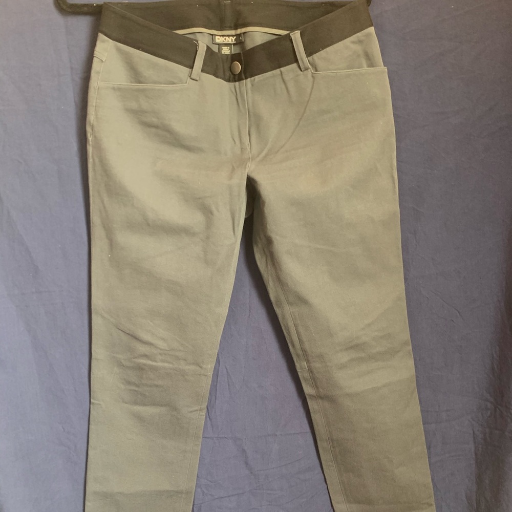 grey and black slacks like pants